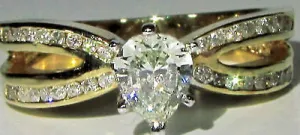 1.02CT PEAR SHAPE DIAMOND RING 14KT MODERN CLASS