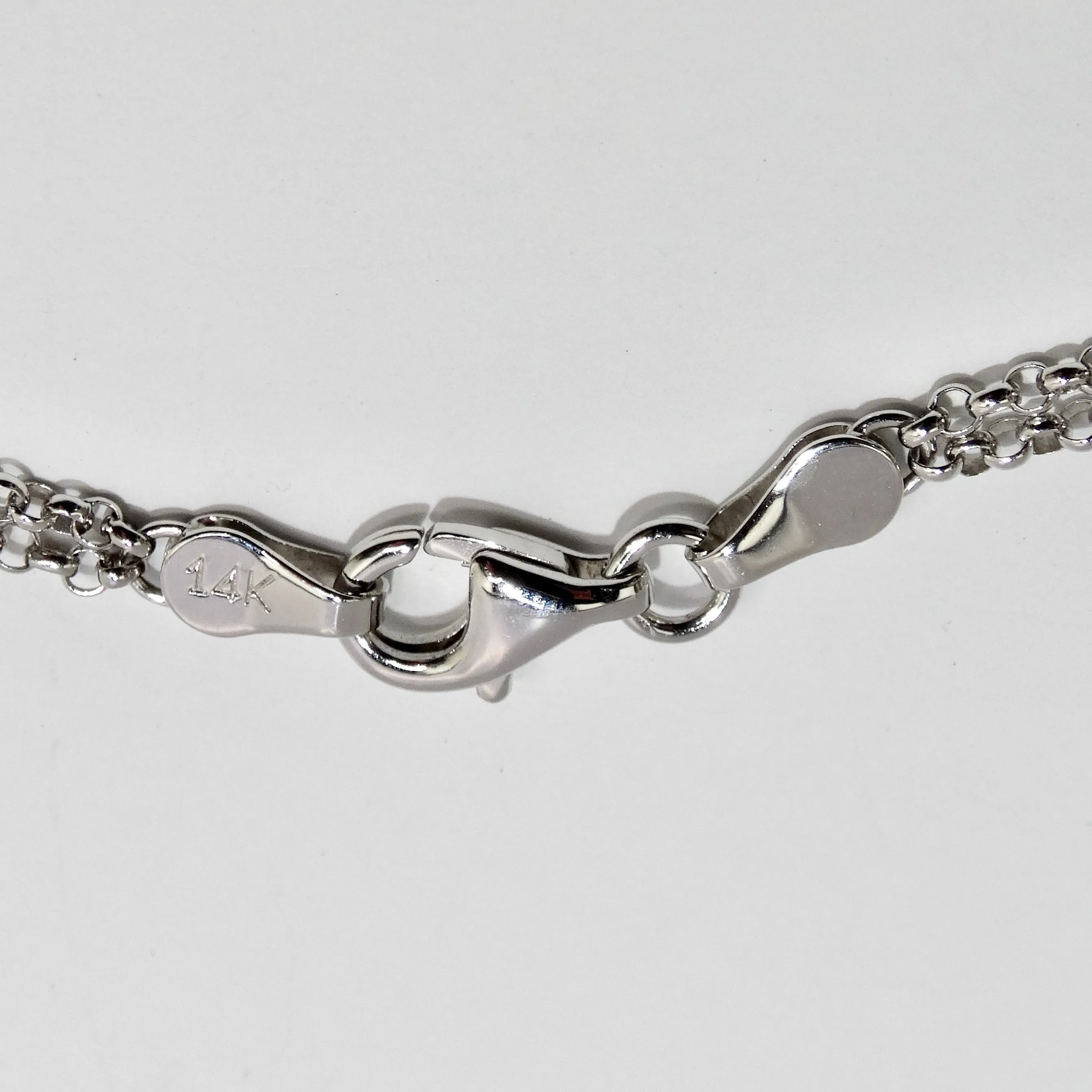 14K White Gold Diamond, Ruby, and Onyx Necklace