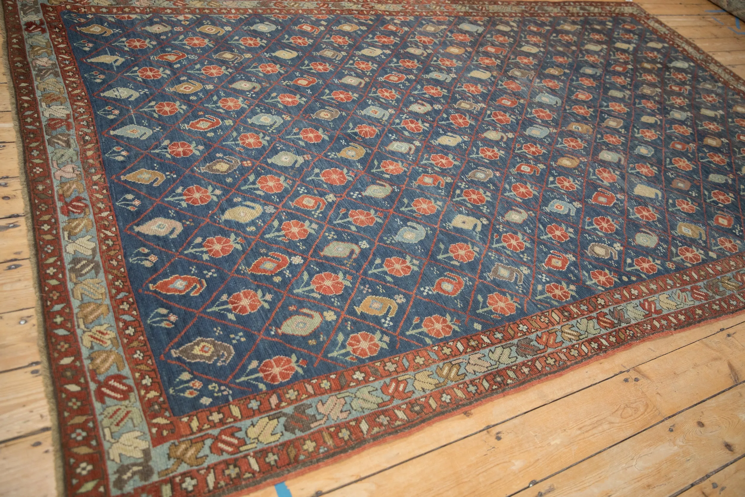 6.5x10.5 Antique Distressed Kurdish Carpet