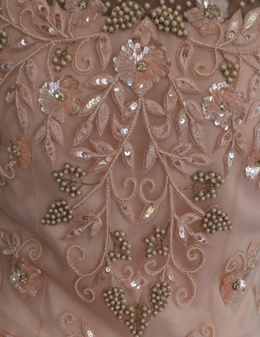 Glam your party with this glamorous Peach Hues gown