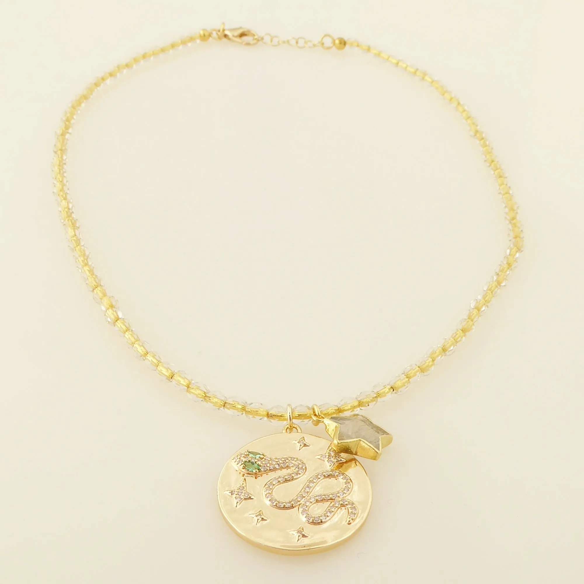 Gold snake medallion necklace