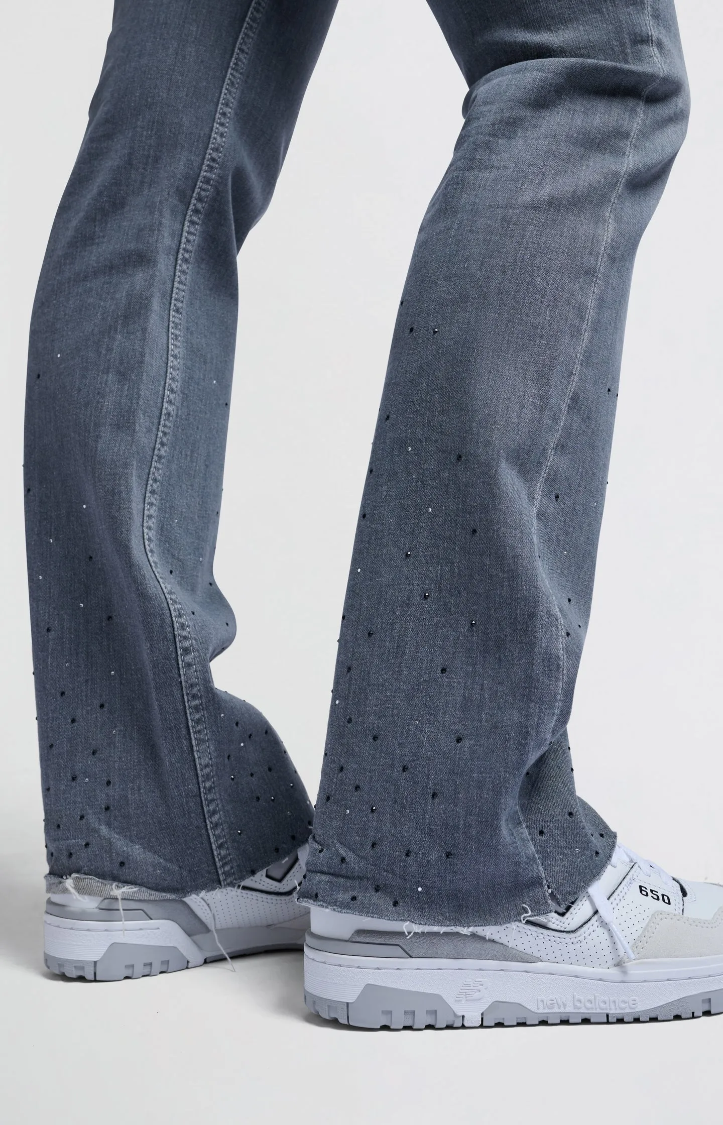 Grey flared denim jeans with rhinestones and high waist